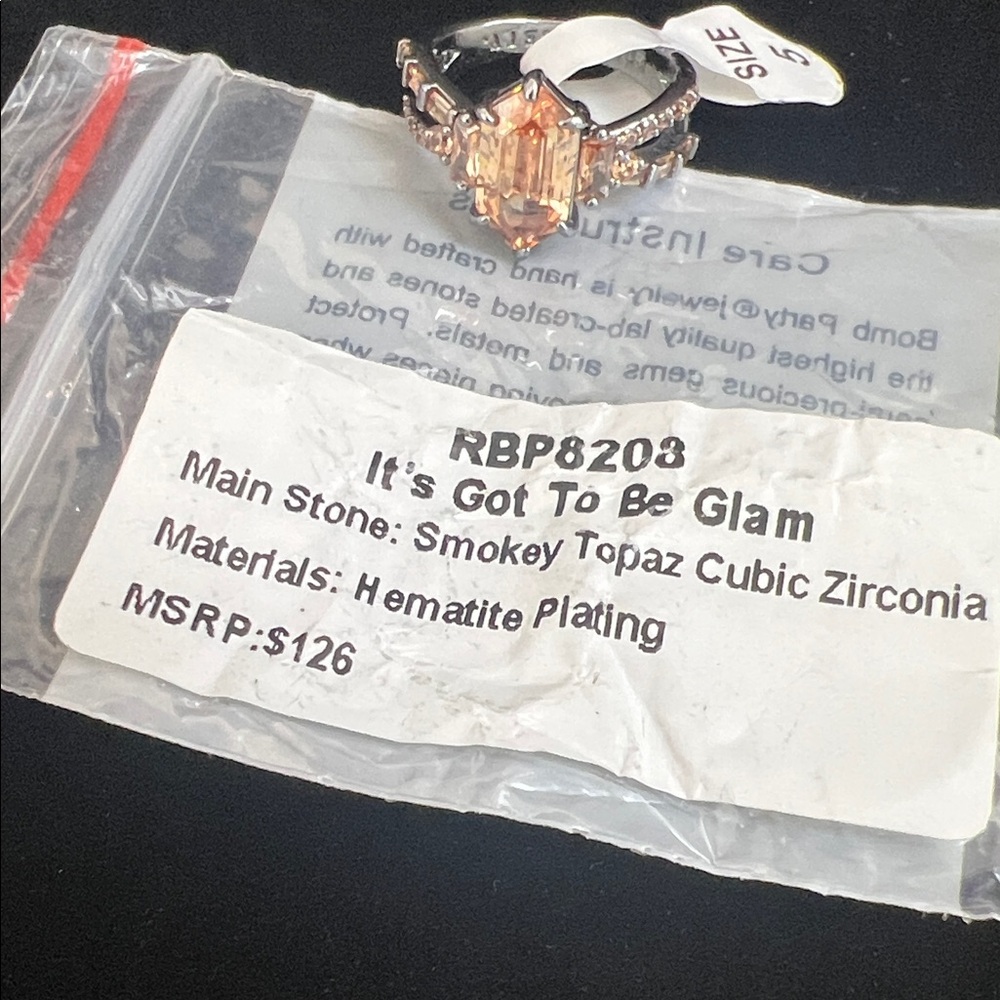 Radiant Silver Ring With Orange Gemstone - image 3